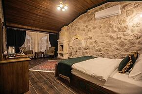 Ada Cave Suites Hotel