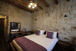 Ada Cave Suites Hotel