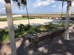 Beach Port - Lovely Villa with Peaceful Porch Views & Tennis Court by