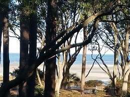 Beach Port - Lovely Villa with Peaceful Porch Views & Tennis Court by