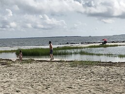 Beach Port - Lovely Villa with Peaceful Porch Views & Tennis Court by 