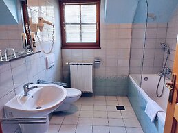 Pohorje Village Wellbeing Resort – Family Apartments Bolfenk