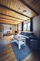 Pohorje Village Wellbeing Resort – Family Apartments Bolfenk