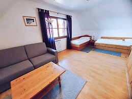 Pohorje Village Wellbeing Resort – Family Apartments Bolfenk