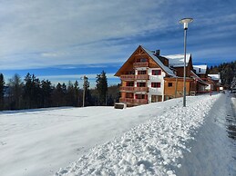 Pohorje Village Wellbeing Resort – Forest Apartments Videc