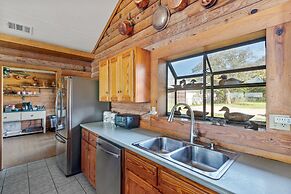 Guadalupe Bluff Log Cabin 4 Bedroom Home by Redawning