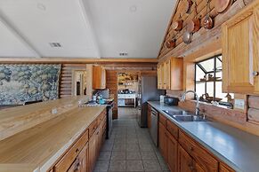 Guadalupe Bluff Log Cabin 4 Bedroom Home by RedAwning