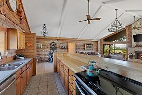 Guadalupe Bluff Log Cabin 4 Bedroom Home by RedAwning