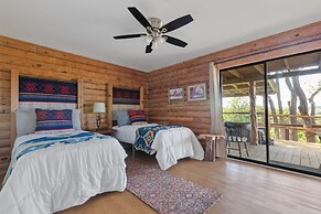 Guadalupe Bluff Log Cabin 4 Bedroom Home by RedAwning