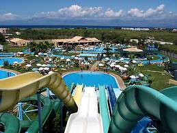 Cute Yellow Handmade House With Garden