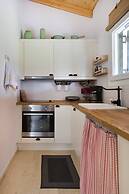 Cute Yellow Handmade House With Garden