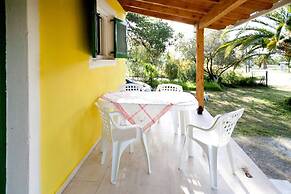 Cute Yellow Handmade House With Garden