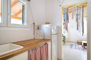 Cute Yellow Handmade House With Garden