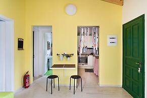 Cute Yellow Handmade House With Garden