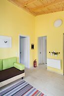 Cute Yellow Handmade House With Garden