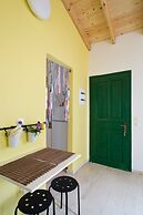 Cute Yellow Handmade House With Garden