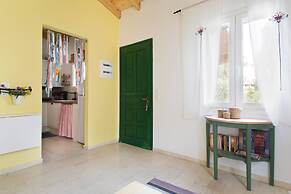 Cute Yellow Handmade House With Garden