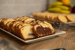 Theos village apartments