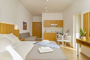 Theos village apartments