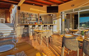 Theos village apartments