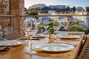 Theos village apartments