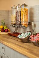 Theos village apartments