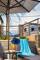 Theos village apartments