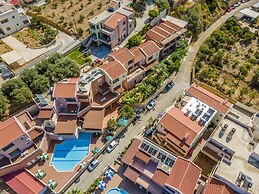 Theos village apartments