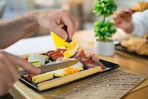 Theos village apartments