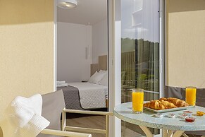 Theos village apartments