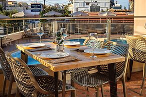 Theos village apartments