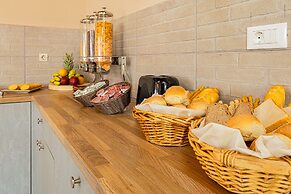 Theos village apartments