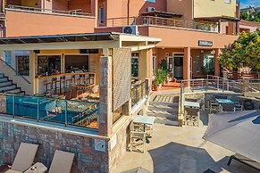 Theos village apartments