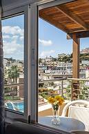 Theos village apartments