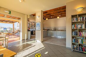 Theos village apartments