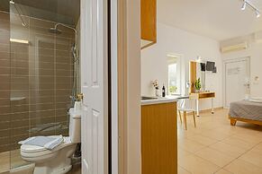 Theos village apartments