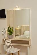 Theos village apartments