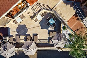 Theos village apartments