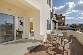 Theos village apartments