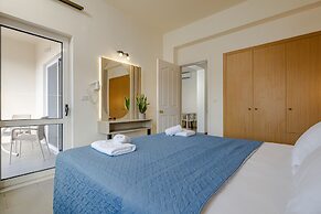 Theos village apartments