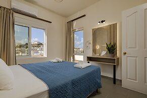 Theos village apartments