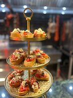 Anise, Aluma Hotel & Resort