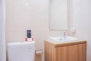 Clean and Elegant 1BR at The Oasis Apartment