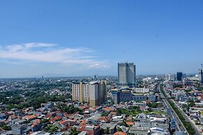 Cozy Studio with Single Bed at Evenciio Margonda Apartment