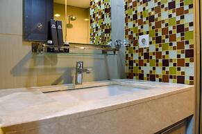 Chic and Cozy 1BR Apartment at H Residence near MT Haryono