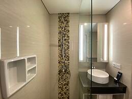 Modern and Spacious Studio Room at Green Kosambi Apartment