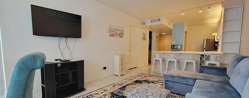 Beach access Condo Nice pool/hot tub area w/bbq 2 Bedroom Home by RedA