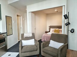 Bright & Cozy 1BR - Kitchen - Laundry