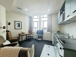 Bright & Cozy 1BR - Kitchen - Laundry