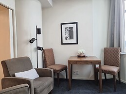 Bright & Cozy 1BR - Kitchen - Laundry